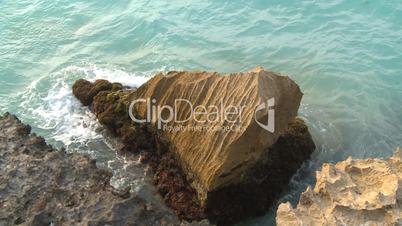 Cuba beach water on rocks