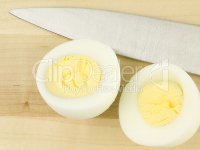 Sliced Egg with Knife