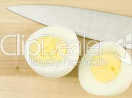 Sliced Egg with Knife