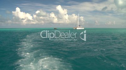 cruising on water open ocean sailboat