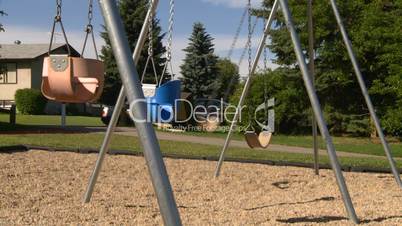 empty kids playground swingset
