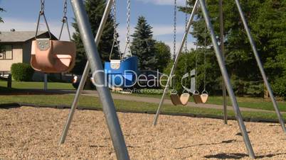 empty kids playground swingset