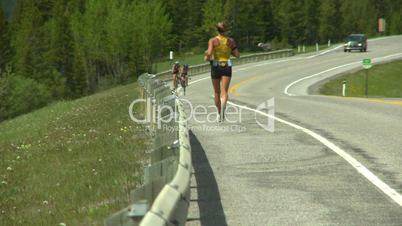 jogger cyclist on highway
