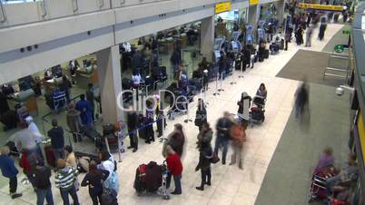 Airport departures people line up