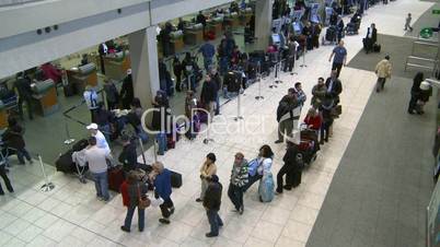 Airport departures people line up