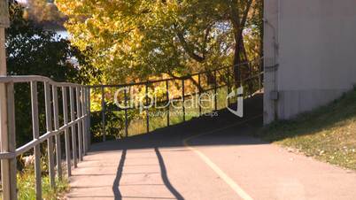 runner on bike path autumn
