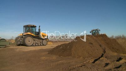 tracked cat and dynapac and loader