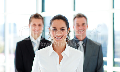 Smiling businesswoman with her team