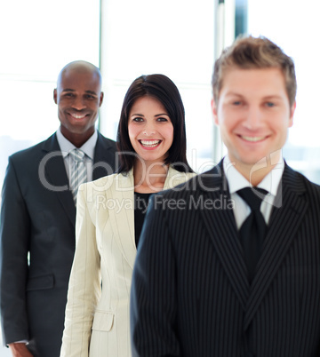Beautiful businesswoman in focus with her team
