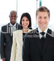 Beautiful businesswoman in focus with her team