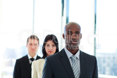 Serious African businessman leading his team