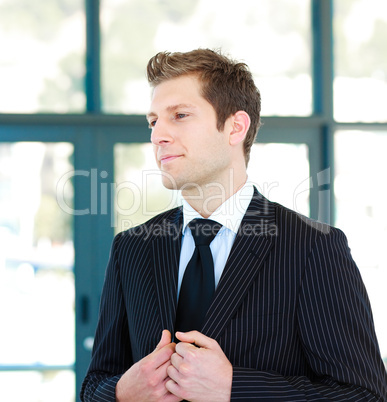 Standing young businessman