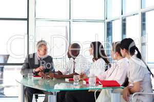 Business people interacting in a meeting