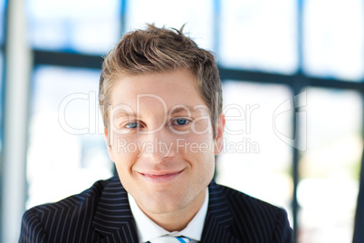 Young businessman smiling