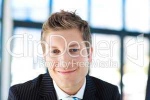 Young businessman smiling