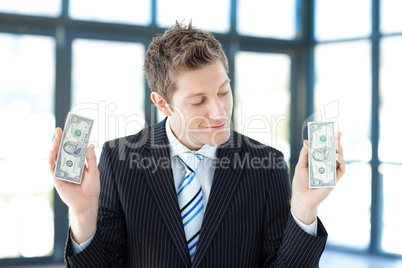 businessman holding money
