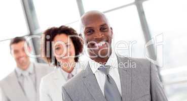 Smiling businessman in a row