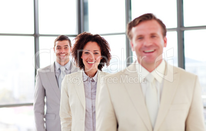 Smiling young businesswoman in a line