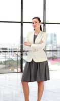 Beautiful businesswoman with folded arms