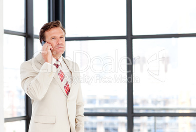 Senior businessman on phone