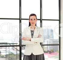 Beautiful businesswoman with folded arms