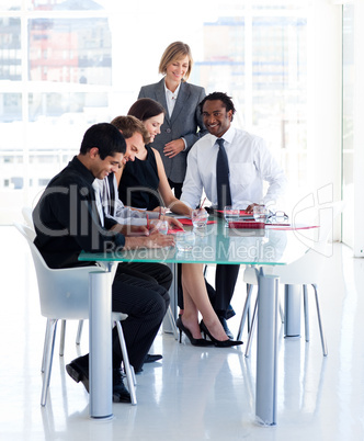 Female manager with her team in office