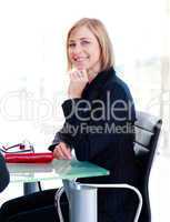 Businesswoman sitting in a meeting