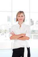 Serious businesswoman with folded arms