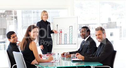 Businesswoman giving a presentation and smiling at the camera