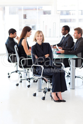 Smiling female manager in a meeting