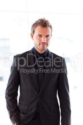 Attractive businessman looking at the camera