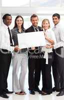 Business people showing a big white card