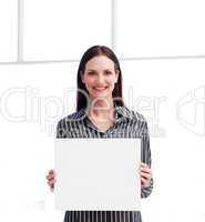 Smiling woman showing a big business card