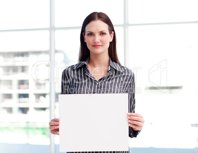 Businesswoman holding a busines card