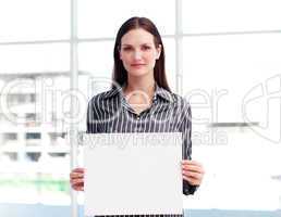Businesswoman holding a busines card