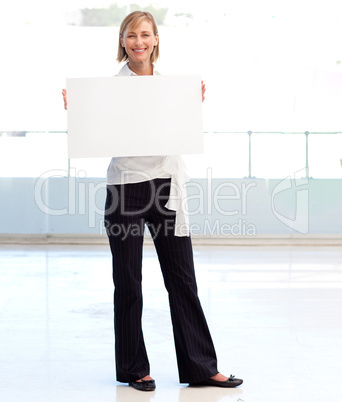 Businesswoman holding a white  card