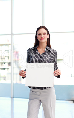 Businesswoman presenting a white  card