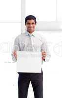 Friendly businessman holding a white card