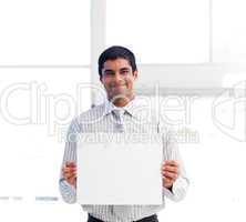 Smiling businessman presenting a white card