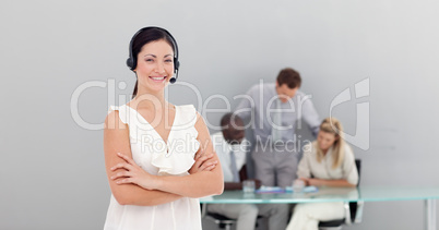 Attractive businesswoman with a headset on