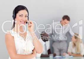 Attractive businesswoman talking on a headset