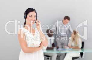 Beautiful businesswoman with a headset on