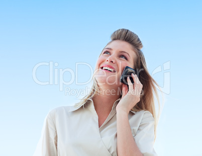Young businesswoman talking on the phone