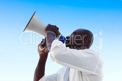 Businessman shouting in a megaphone