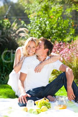 Couple having picnic in a park