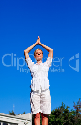 Beautiful woman practising meditation