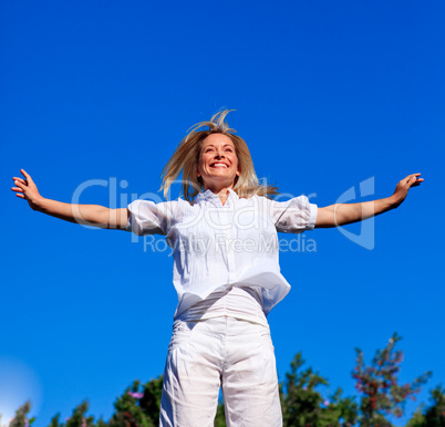 Carefree young woman enjoying life