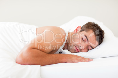 Man sleeping in bed