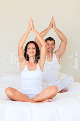 Young couple meditating
