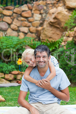 Father giving daughter piggyback